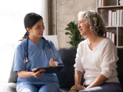 Medical office nurse consulting a patient